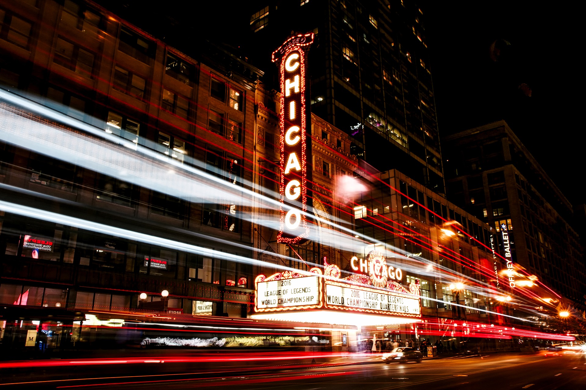 Outside a Chicago theatre, with a huge 'Chicago' sign outside